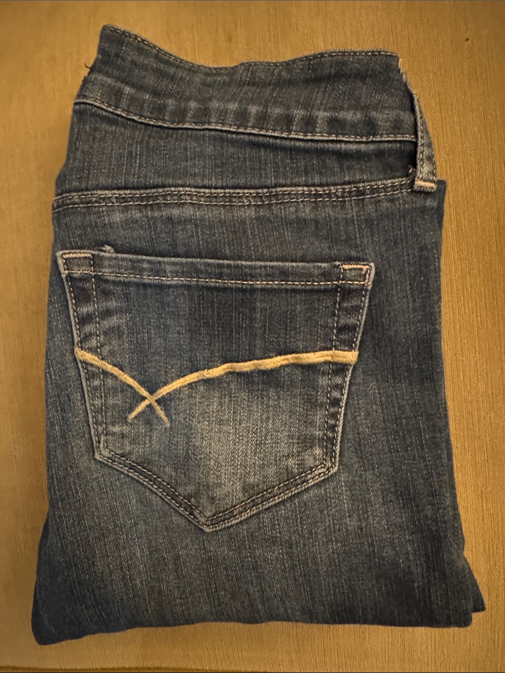 Bullhead Women’s Skinny Jeans in Dark Blue with Tan Stitching